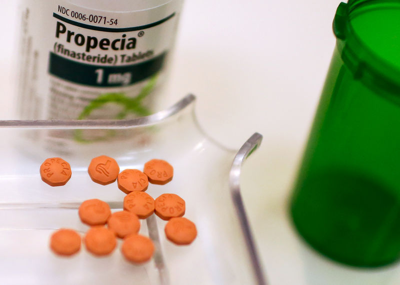 © Reuters. A bottle of Propecia is seen on a pharmacy shelf in New York