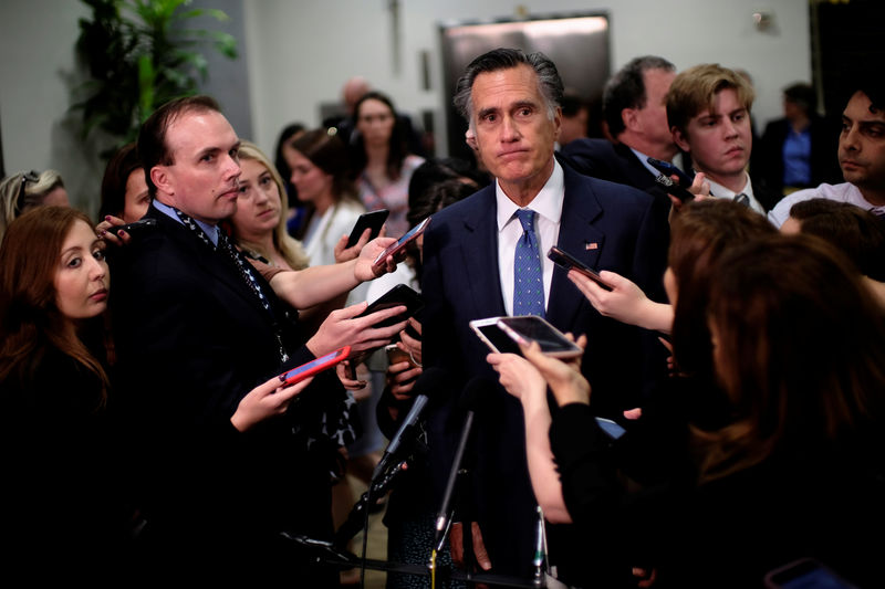 © Reuters. U.S. Senator Mitt Romney (R-UT) speaks to reporters after being briefed on Iran by the Secretary of State and acting Defense Secretary on Capitol Hill in Washington