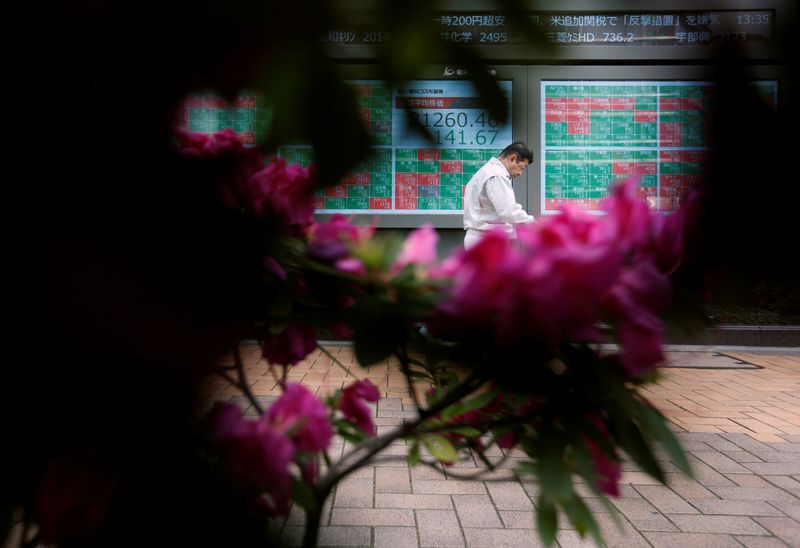 World shares slump for fifth day, bets grow on interest rate cuts to counter damage