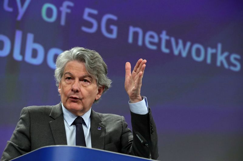 © Reuters. FILE PHOTO: European Commissioner for the Internal Market Breton gestures as he communicates on the EU's 5G plan in Brussels