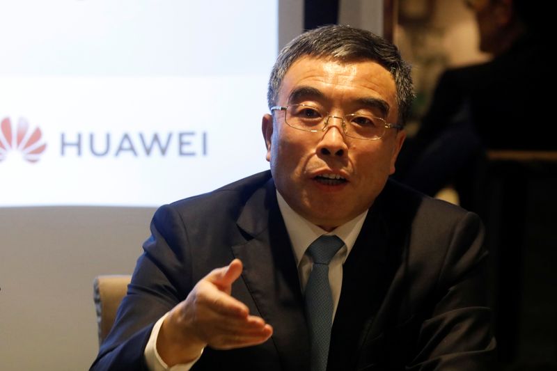 © Reuters. Liang Hua chairman of Huawei attends a news conference in Paris
