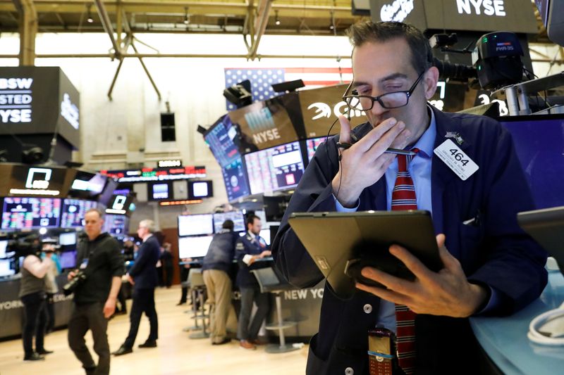Wall Street tumbles again on virus fears, confirming correction