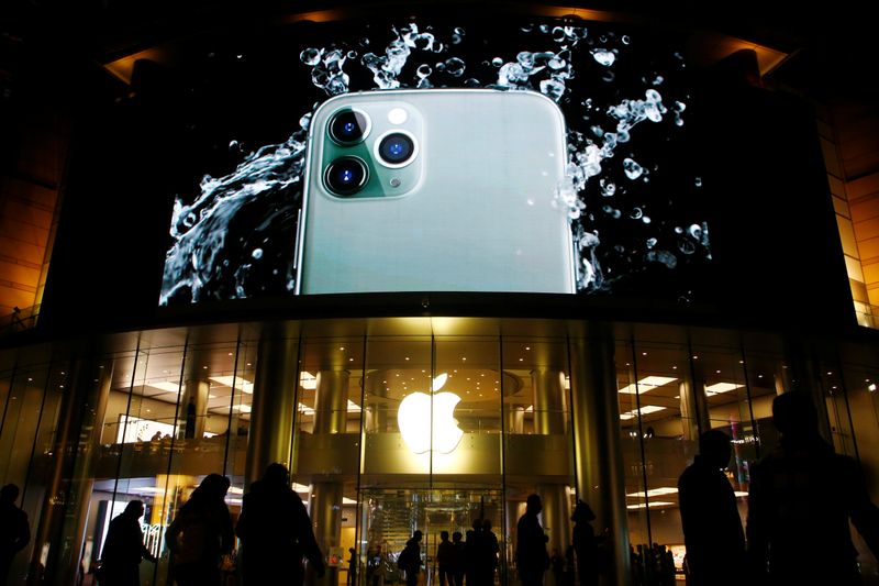 &copy; Reuters. FILE PHOTO:  Screen displaying an advertisement for iPhone 11 Pro is seen outside an Apple store in Beijing