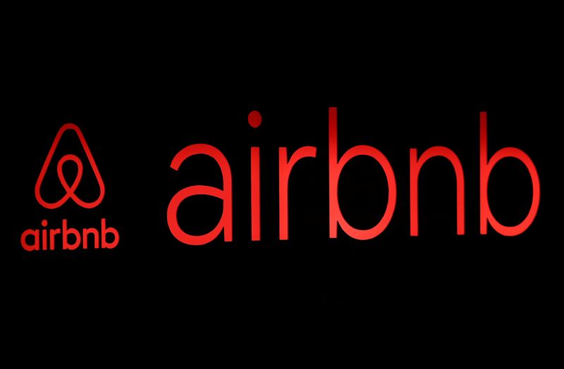 &copy; Reuters. The logos of Airbnb are displayed at an Airbnb event in Tokyo