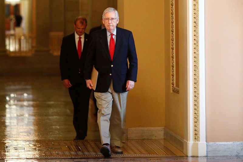 &copy; Reuters. Senate Majority Leader McConnell speaks to members of the news media after departing from the Senate Chamber floor on Capitol Hill in Washington