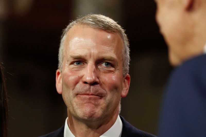 &copy; Reuters. U.S. Senator Dan Sullivan smiles after he was ceremonially sworn-in by Vice President Joseph Biden in the Old Senate Chamber on Capitol Hill in Washington