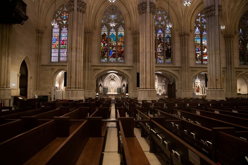 © Reuters. Empty seats are seen during an Easter service at St. Patrick's Cathedral as the outbreak of the coronavirus disease (COVID-19) continues in the Manhattan borough of New York City