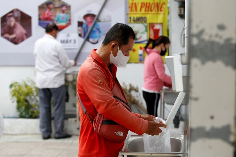 Rice ATM' feeds Vietnam's poor amid virus lockdown By Reuters