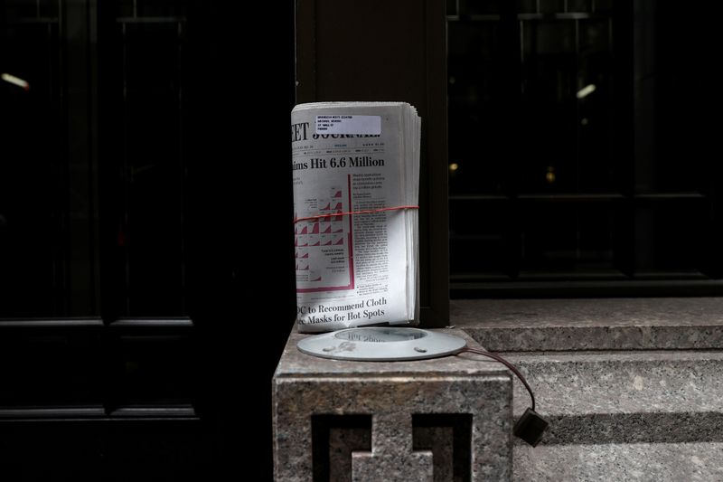 &copy; Reuters. An uncollected Wall Street Journal newspaper on nearly deserted Wall Street during the outbreak of coronavirus disease (COVID-19) in New York