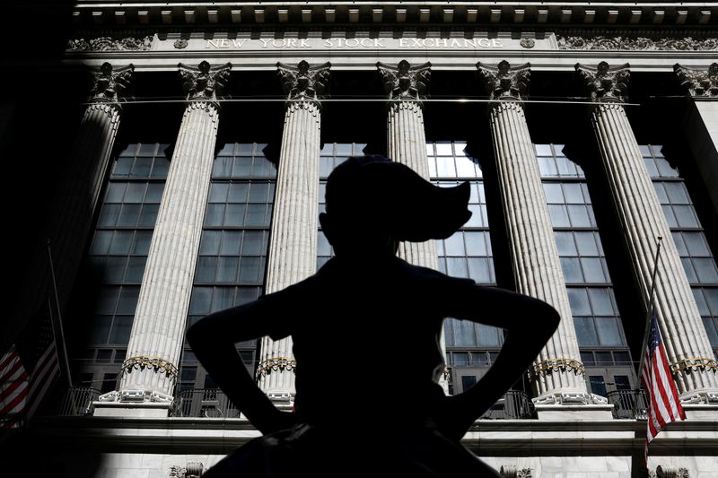 &copy; Reuters. The &quot;Fearless Girl&quot; sculpture is seen outside The New York Stock Exchange building in New York City