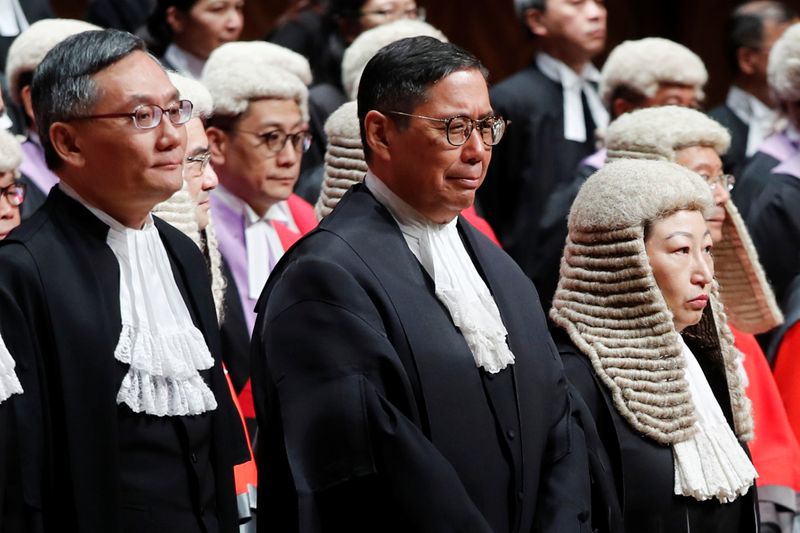 &copy; Reuters. Judges of the Court of Final Appeal Andrew Cheung Kui-nung, Robert Ribeiro and Secretary of Justice Teresa Cheng attend a ceremony to mark the beginning of the legal year in Hong Kong