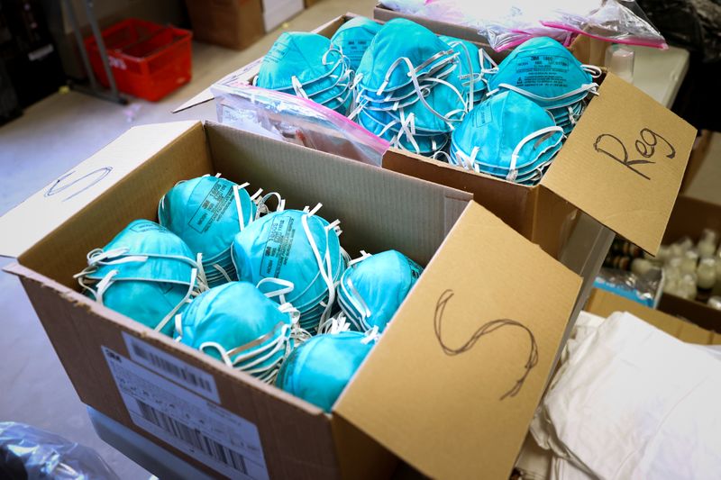 &copy; Reuters. FILE PHOTO: Boxes of N95 protective masks for use by medical field personnel are seen at a New York State emergency operations incident command center during the coronavirus outbreak in New Rochelle