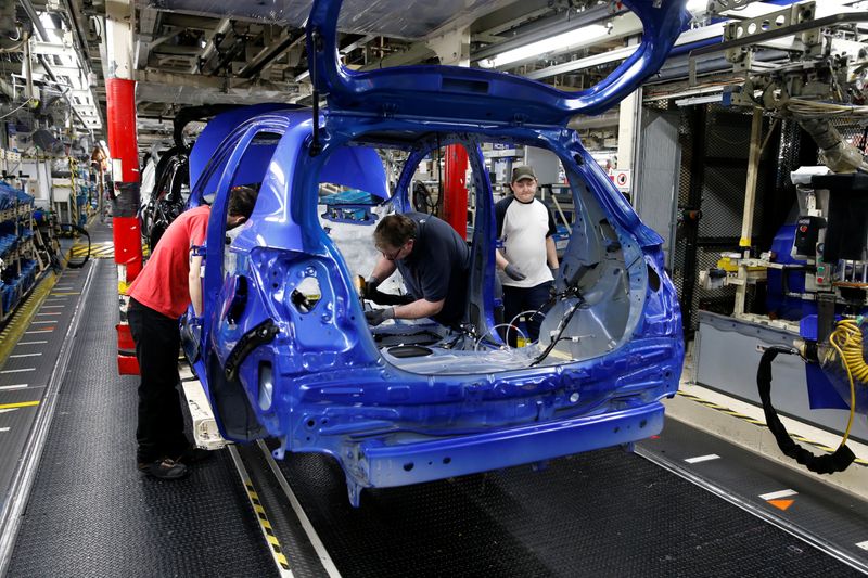 &copy; Reuters. Employees work on the assembly line to build Yaris cars at Toyota&apos;s automobile manufacturing plant in Onnaing