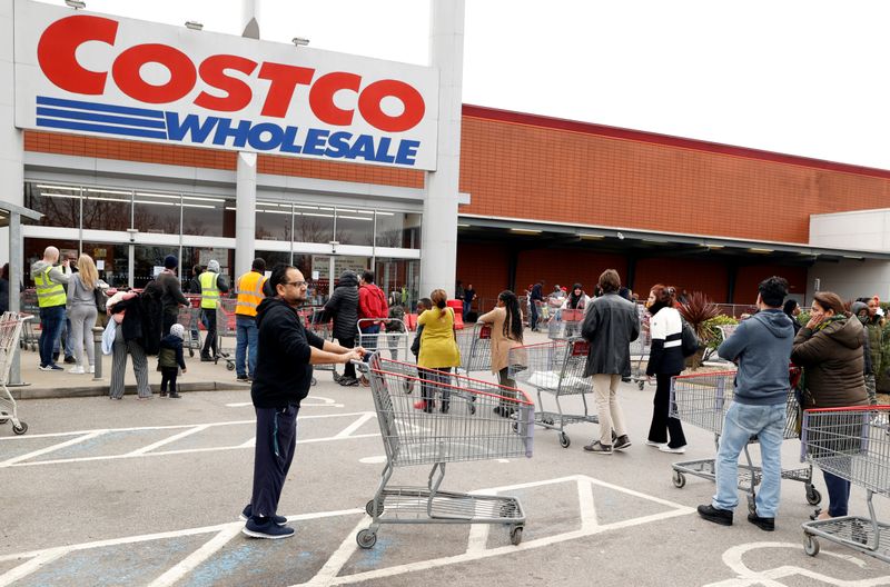 &copy; Reuters. Customers queue to enter a Costco Wholesalers in Chingford, Britain