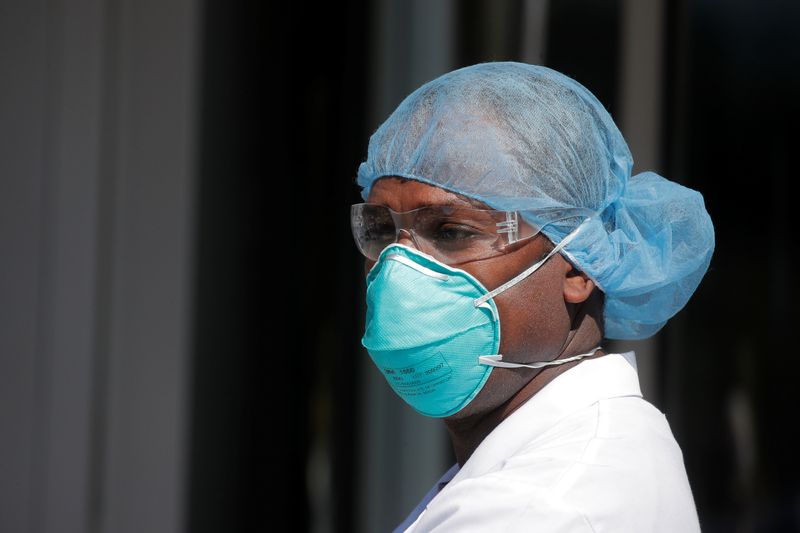 &copy; Reuters. FILE PHOTO: Nurses at Montefiore Medical Center Moses Division in Bronx hold protest demanding more PPE during outbreak of coronavirus disease (COVID-19) in New York