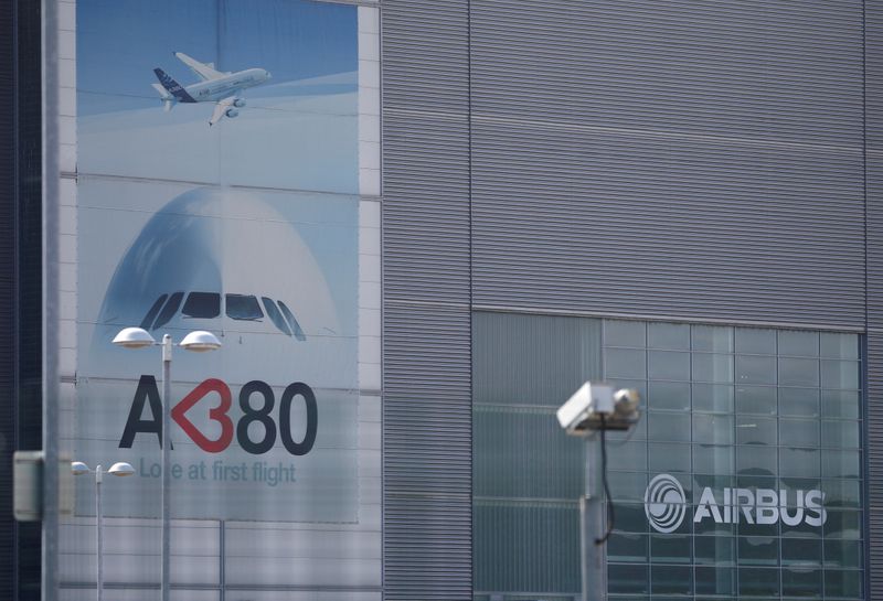 © Reuters. FILE PHOTO: Branded posters are seen at Airbus' wing assembly plant at Broughton, near Chester