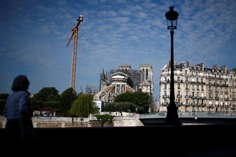 &copy; Reuters. Restoration work resumes slowly at Notre Dame Cathedral in Paris