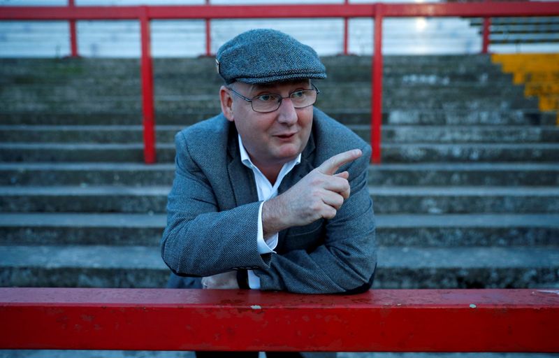 © Reuters. FILE PHOTO: Accrington Stanley chairman Andy Holt poses for a photograph ahead of his sides match against Blackpool at the Wham Stadium in Accrington