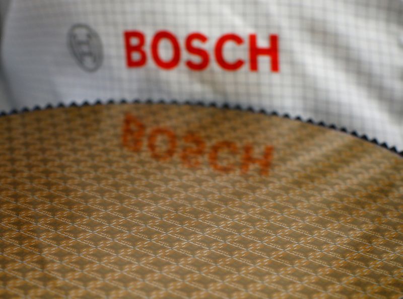 © Reuters. Bosch logo is reflected in semiconductor wafer in company manufacturing base in Reutlingen
