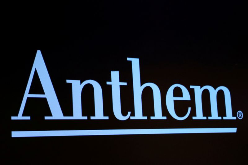 © Reuters. The logo for health insurance provider, Anthem, is displayed on a screen on the floor at the NYSE in New York