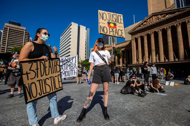 © Reuters. Protesters participate in a Black Lives Matter (BLM) rally in Brisbane