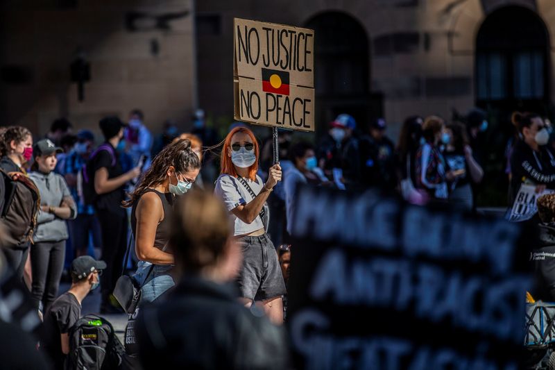 © Reuters. Protesters participate in a Black Lives Matter (BLM) rally in Brisbane