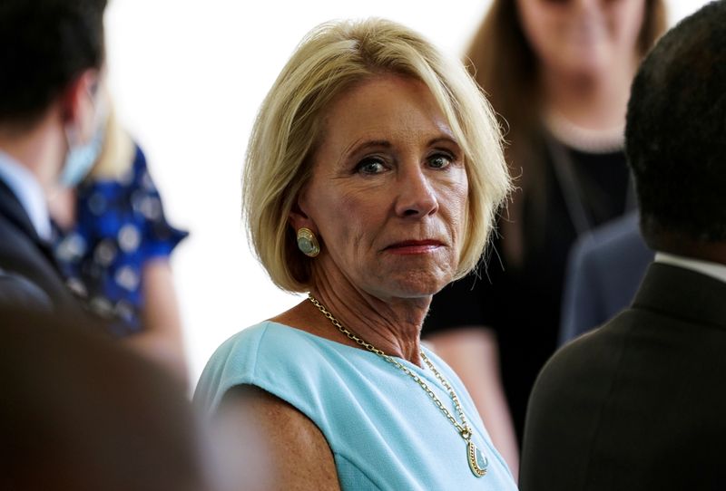 &copy; Reuters. FILE PHOTO: Education Secretary Devos attends signing ceremony at the White House in Washington