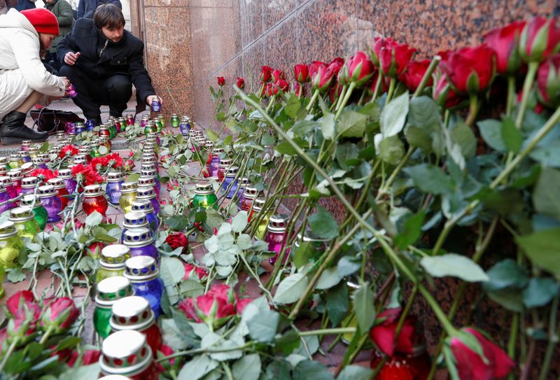 &copy; Reuters. Commemoration ceremony for the people killed in the Ukraine International Airlines plane that was shot down in Iran, in front of the Iranian embassy in Kiev