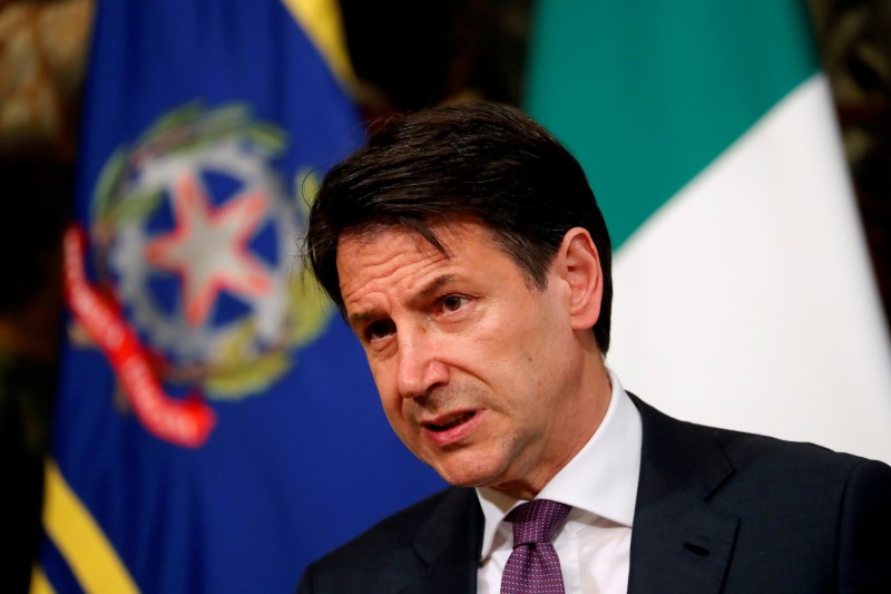 &copy; Reuters. FILE PHOTO: Italian Prime Minister Giuseppe Conte looks on as he holds a news conference at Chigi Palace in Rome