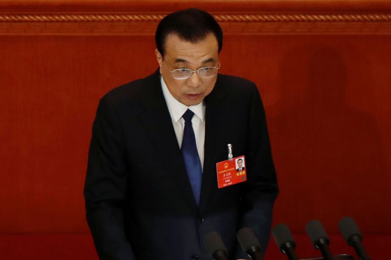 &copy; Reuters. Chinese Premier Li Keqiang delivers a speech at the opening session of NPC in Beijing