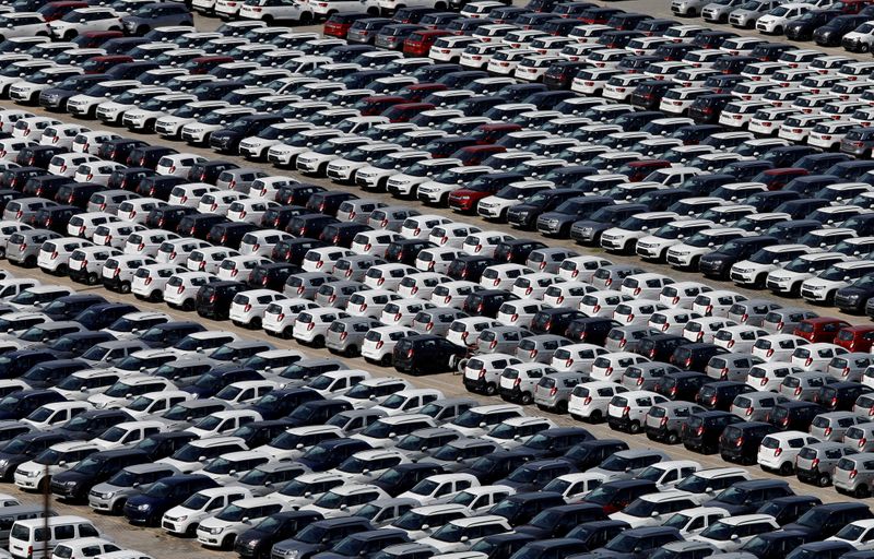 © Reuters. FILE PHOTO: Cars are seen parked at Maruti Suzuki's plant at Manesar