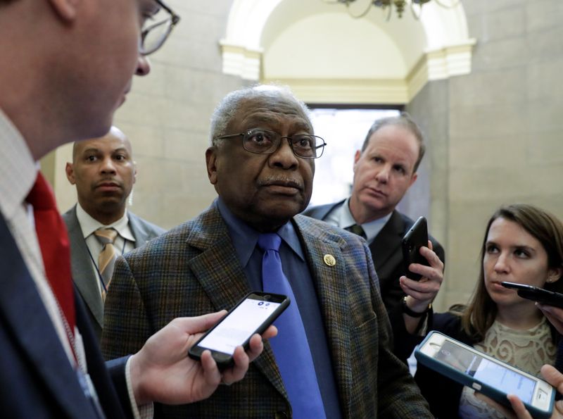 &copy; Reuters. Rep. Clyburn talks to reporters ahead of House coronavirus economic aid package vote on Capitol Hill in Washington