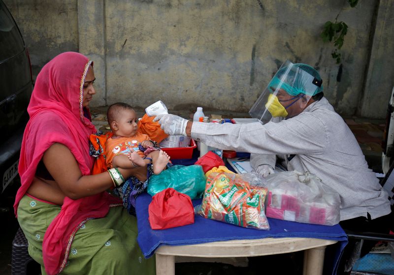 &copy; Reuters. FILE PHOTO: Outbreak of coronavirus disease (COVID-19) in Ahmedabad