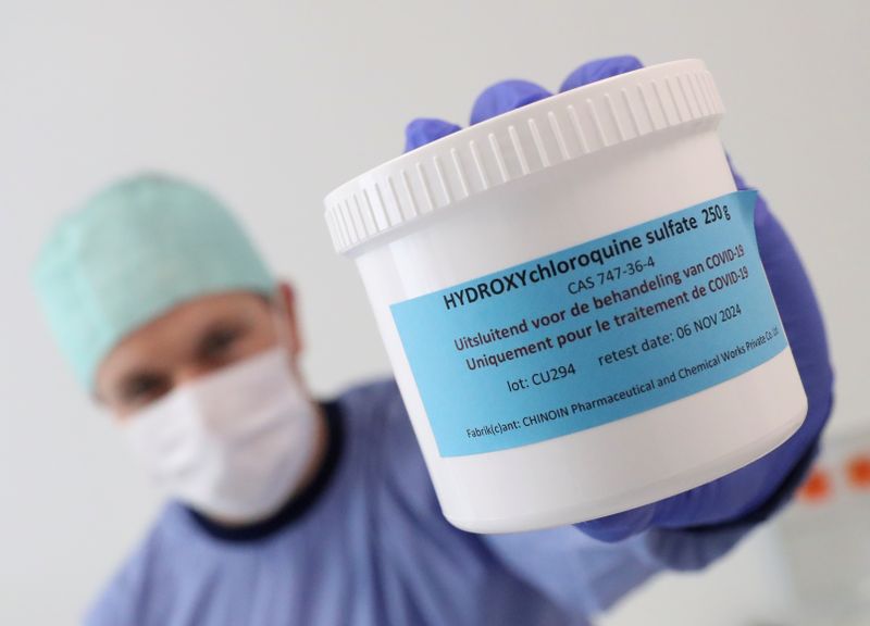 &copy; Reuters. FILE PHOTO: A pharmacist displays a box of Hydroxychloroquine at the CHR Centre Hospitalier Regional de la Citadelle Hospital amid the coronavirus disease (COVID-19) in Liege