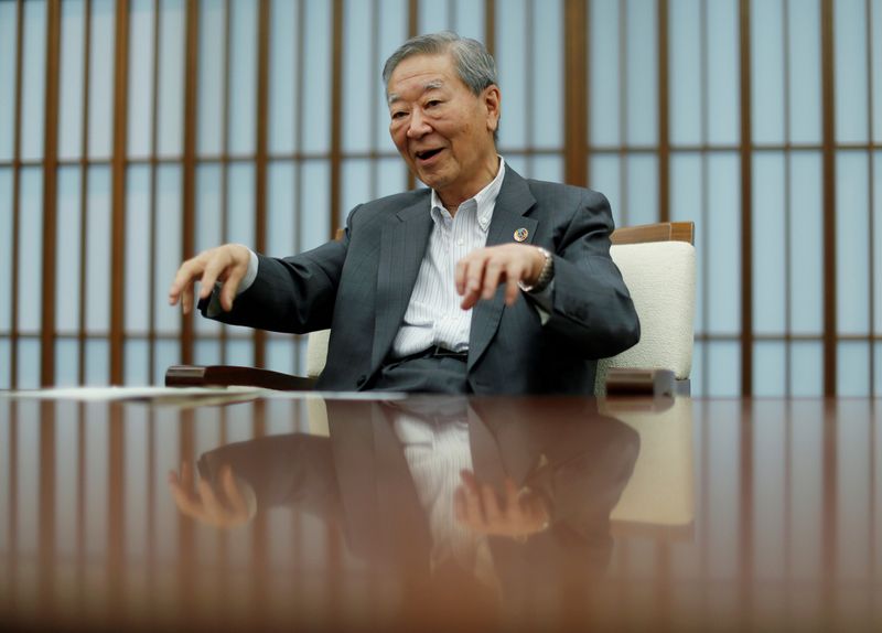 &copy; Reuters. FILE PHOTO: Hiroaki Nakanishi, chairman of Keidanren and Executive Chairman of Hitachi Ltd. speaks during an interview with Reuters in Tokyo