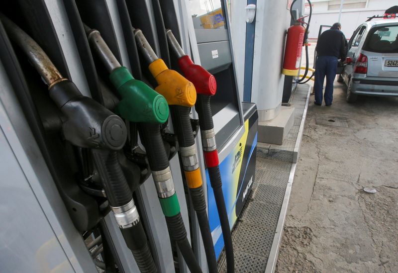 &copy; Reuters. Pump nozzles are pictured at a gas station in Algiers