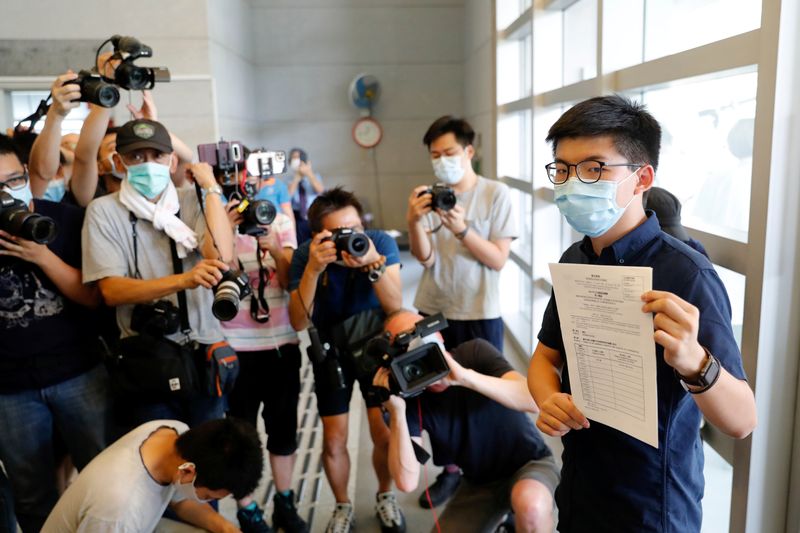 &copy; Reuters. Pro-democracy activist Joshua Wong registers as a candidate for the upcoming  Legislative Council election in Hong Kong