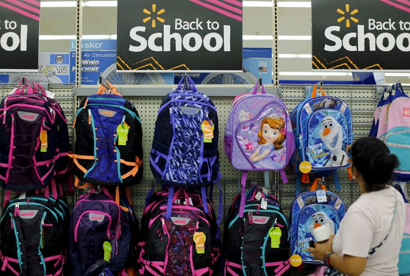 &copy; Reuters. FILE PHOTO: A woman shops for back to school supplies at a Walmart store in San Diego, California