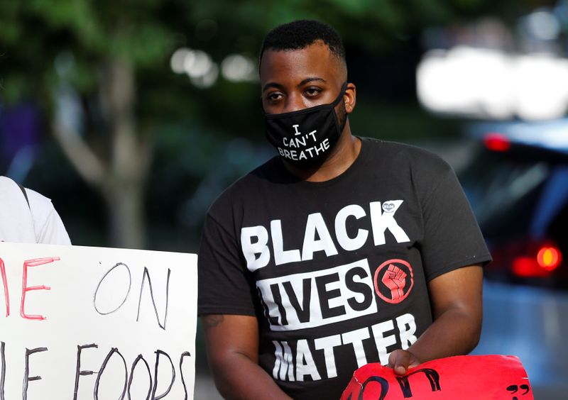 &copy; Reuters. Workers of the South Lake Union Whole Foods protest against store management not allowing workers to wear Black Lives Matter apparel in Seattle