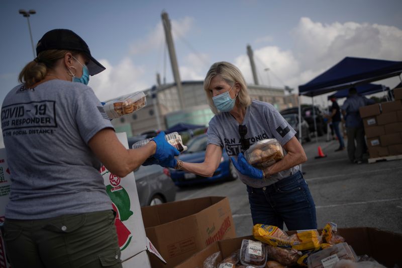 &copy; Reuters. 情報ＢＯＸ：新型コロナウイルス、世界の感染者1461万人超　死者約60.7万人