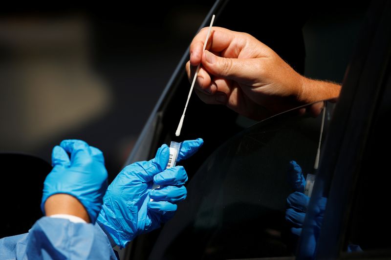 &copy; Reuters. New drive through testing site opens at closed high school in California