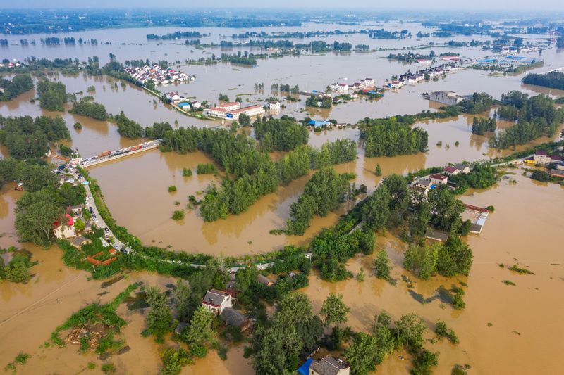 &copy; Reuters. Aerial view shows the flooded Gu town following heavy rainfall in the region, in Luan