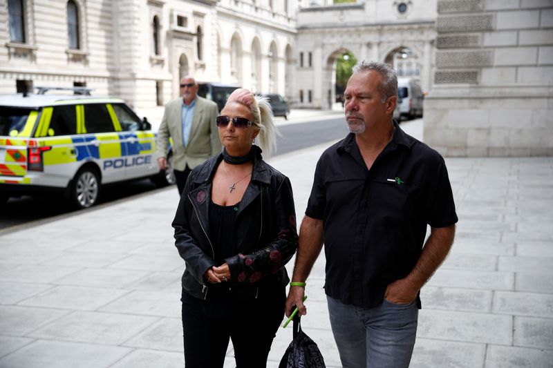 &copy; Reuters. Charlotte Charles, mother of Harry Dunn, and Dunn&apos;s stepfather Bruce Charles walk outside the Foreign and Commonwealth Office in London
