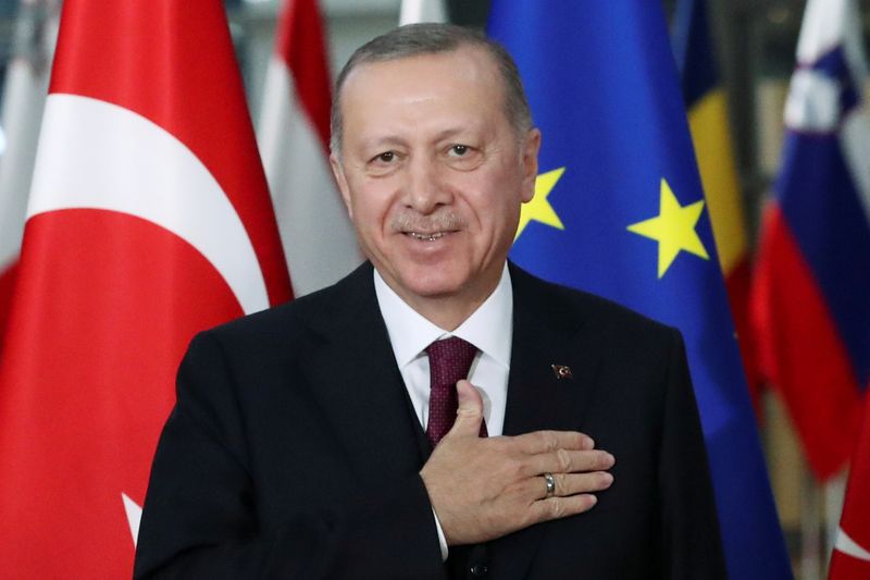 &copy; Reuters. FILE PHOTO: Turkish President Tayyip Erdogan reacts ahead of a meeting with EU Council President Charles Michel pose in Brussels