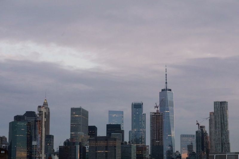 &copy; Reuters. FILE PHOTO: The skyline of lower Manhattan is seen before sunrise in New York
