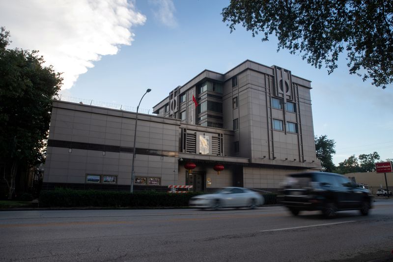 &copy; Reuters. FILE PHOTO: Vehicles pass by the China Consulate General in Houston, Texas