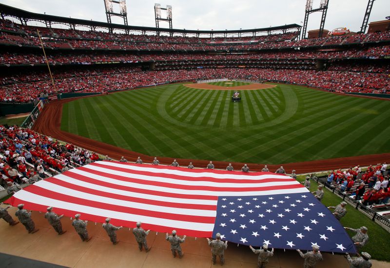 &copy; Reuters. FILE PHOTO: The national anthem is played before Game 3 of the MLB playoff baseball series between the St. Louis Cardinals and the San Francisco Giants