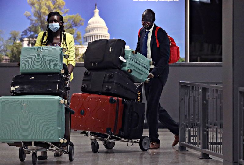 &copy; Reuters. South Sudan&apos;s Economist Peter Biar Ajak arrives in Dulles International Airport, US, after fleeing Kenya