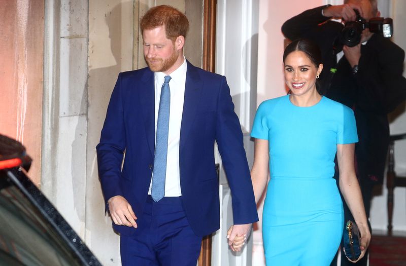 &copy; Reuters. FILE PHOTO: Britain&apos;s Prince Harry and his wife Meghan, Duchess of Sussex, leave after attending the Endeavour Fund Awards in London