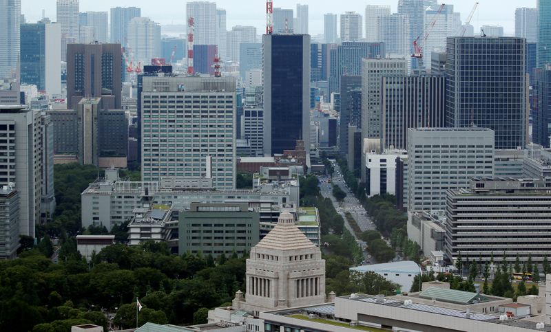 &copy; Reuters. The Parliament Building is seen in front of office buildings of government ministeries in Tokyo